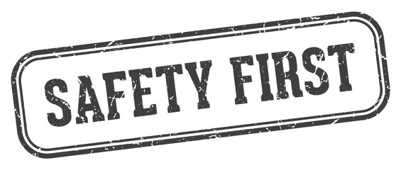 safety first stamp. safety first rectangular stamp on white background