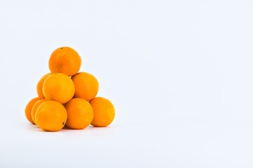 A vibrant image showcasing mandarins on a white background.
