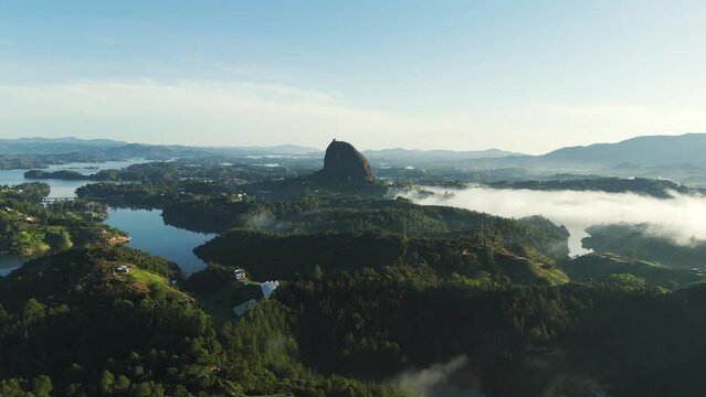 Colombia Landscape with El Penon de Guatape Mountain, Aerial with Blue Sky Copy Space