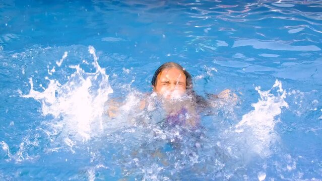 the child drowns in the water. Selective focus. kid.