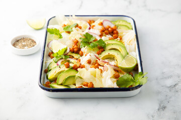 Leaf salad with avocado and chickpeas