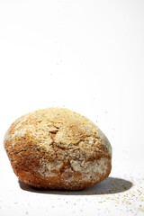 A loaf of rye bread on a white background