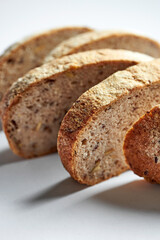 A loaf of rye bread on a white background