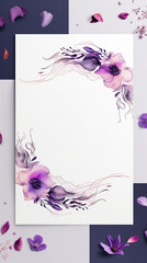 A blank floral invitation card with flowers on a light grey background. The card is surrounded by purple flowers, herbs and other blossoms. 