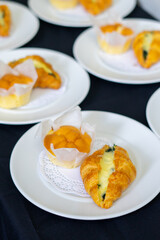 Catering. Off-site food. orange cake and Croissant