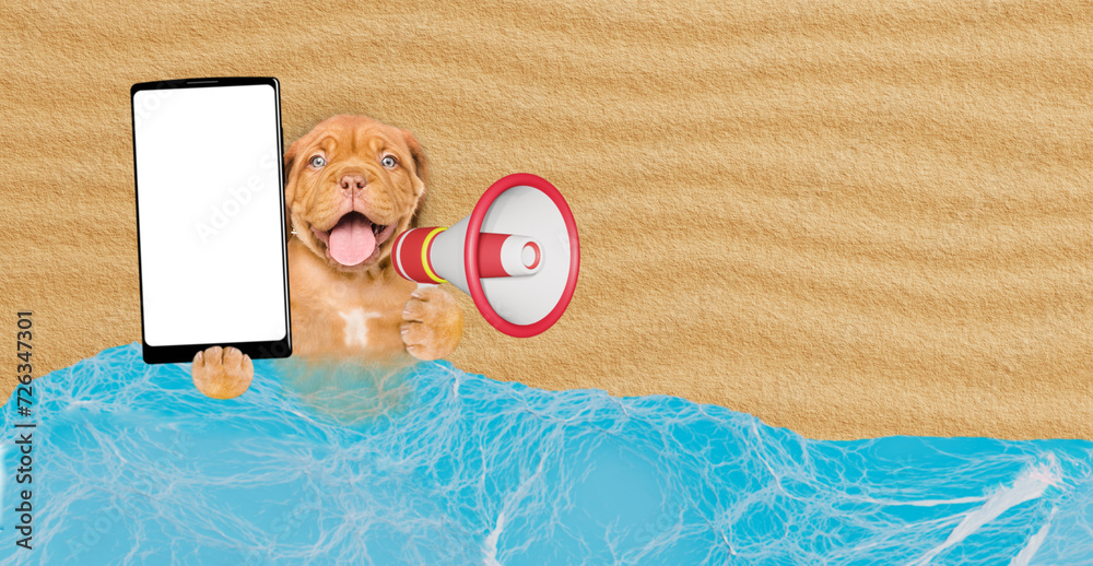 Aufkleber Happy Mastiff mastiff puppy lying at sunny beach and showing big smartphone with white blank screen in it paw and screaming into a megaphone. Empty space for text