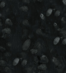 Lots of fingerprints on a black background in close-up