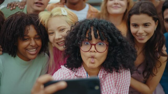 Multiethnic group of teenagers hanging out in the city center. Concepts about campus university students, friendship, and generation z