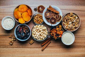 top view of dried fruits nuts on wooden table