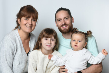 group of parents and children on white background