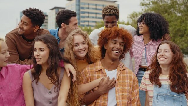 Multiethnic group of teenagers hanging out in the city center. Concepts about campus university students, friendship, and generation z