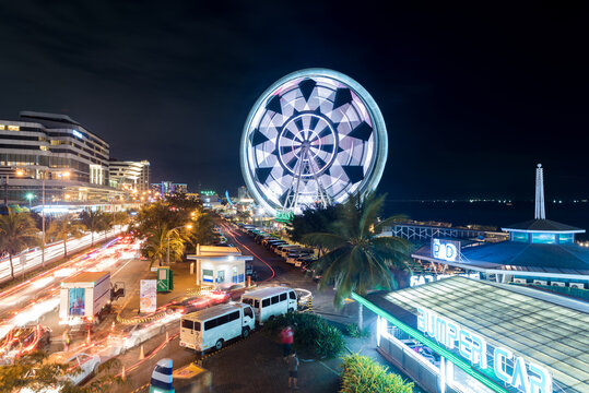 Mall of Asia in Manila, Pasay. Long Exposure Night Photo Shoot with Spinning attraction.