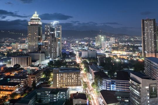 Night Cebu Cityscape with Buildings Lights in Background. Philippines.