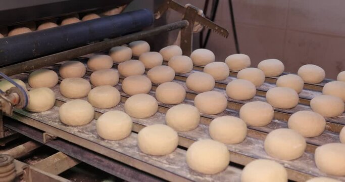 Automatic bakery production line with bread in bakery factory