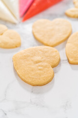 Heart-shaped sugar cookies with royal icing