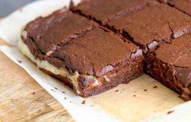 Fototapeta na wymiar Brownie cake homemade, spongy chocolate brownie close up, selective focus