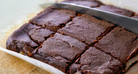 Brownie cake homemade, spongy chocolate brownie close up, selective focus