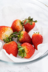 Washed and Dried Strawberries Neatly Stored in a Glass Bowl