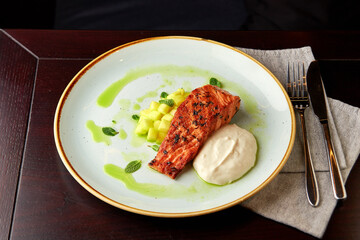 Grilled Salmon Fillet with Apples and Mint Sauce.