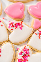 Heart-shaped sugar cookies with royal icing