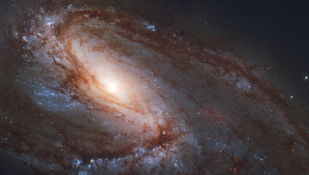 Panoramic spiral galaxy, NGC 3627. Bright orange, red blue, black hole galactic long-range captured image. Elements of this image furnished by NASA (observed by the Hubble telescope)