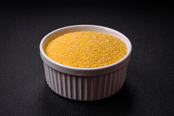 Corn grains or particles are yellow in color when raw