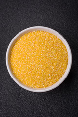 Corn grains or particles are yellow in color when raw