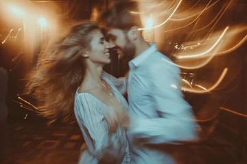 Foto op Plexiglas Dansschool Blurred photo of young couple dancing in club. Disco concept
