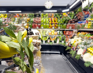 choosing fruit at the grocery store