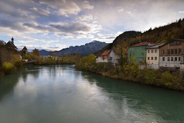 Fototapeta na wymiar View of the Lech river in autumn in Fussen, Germany