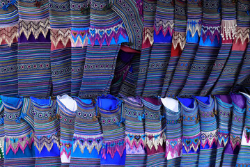 Ethnic clothes for sale in Coc Ly market in Vietnam
