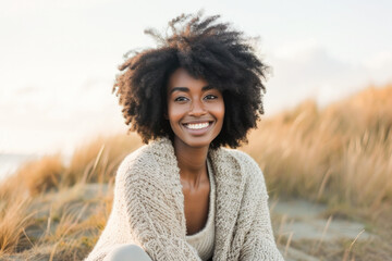 Portrait in the beach of a pleased 30 years old woman. Lifestyle portrait photography of a satisfied woman in her 30s against a beach background.  - obrazy, fototapety, plakaty