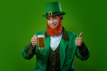 Leprechaun elf on St. Patrick's Day. Cheerful character Irish leprechaun for advertising with a red...