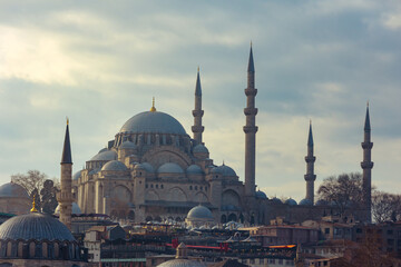 Fototapeta na wymiar Rustempasa Mosque and Suleymaniye Mosque view with cloudy sky.