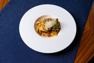 Pasta with Italian sauce served on a large plate