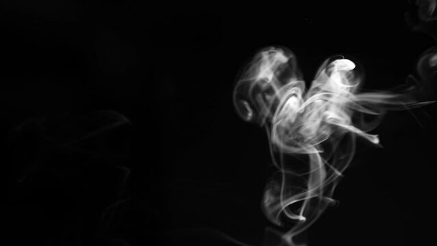 white smoke best for using in composition, overlay, steam on black background