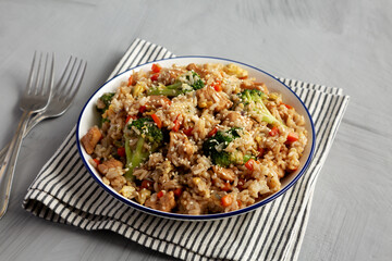 Homemade Chicken Teriyaki Fried Rice on a Plate, side view.