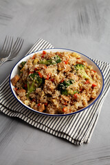 Homemade Chicken Teriyaki Fried Rice on a Plate, side view.