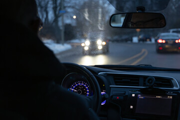 glare from headlights of a suv in opposite direction