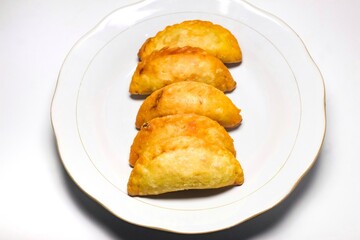 Fried empanadas on a plate