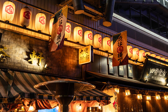 Tokyo, Japan, 27 October 2023 : Outdoor Heating Lamps At A Cozy Japanese Restaurant.