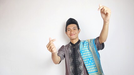 Asian Muslim man excited expression