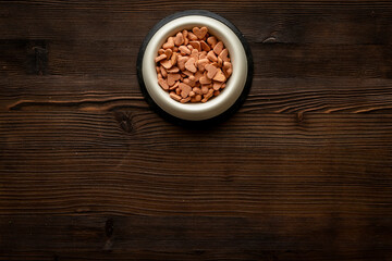 Food and treats for pets - biscuits in a shape of heart in a bowl