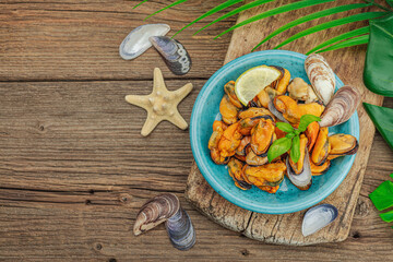 Mussels with oil, spices and greens. Healthy seafood is rich in omega. Marine decor