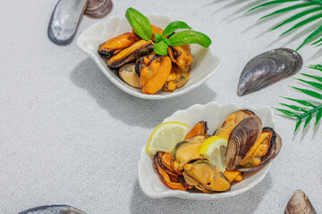 Mussels with oil, spices and greens. Healthy seafood is rich in omega. Marine decor