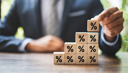 rising percentage signs in blocks, symbolizing inflation and economic growth