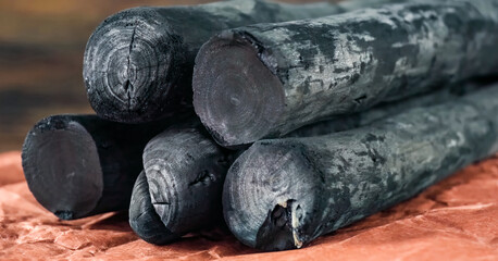 Natural wood charcoal for Barbecue Grill close up. Charcoal coals texture