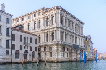 Fototapeta na wymiar Venice, Italy with canals, gondolas, bridges, palazzo, castles at Grand Canal