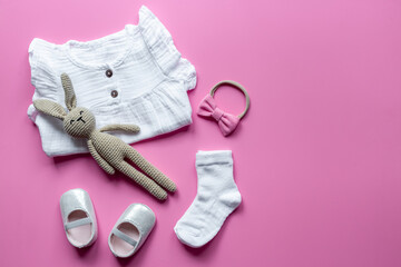 Set of baby girl dress and accessories, top view. Kids wear flat lay