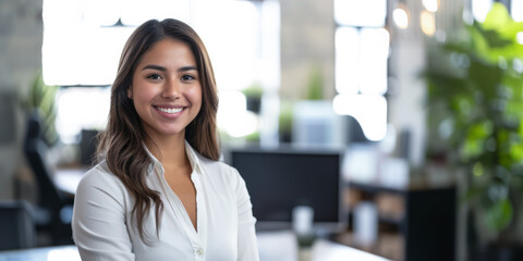 Latin businesswoman portrait at her office